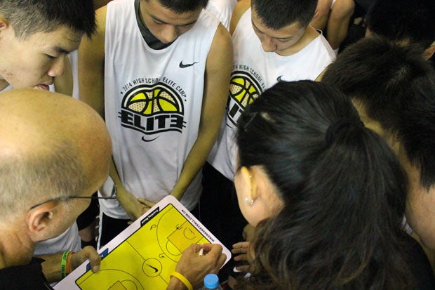 Coach Frank Allocco draws up last-second play that was executed but the 3-point try missed. 