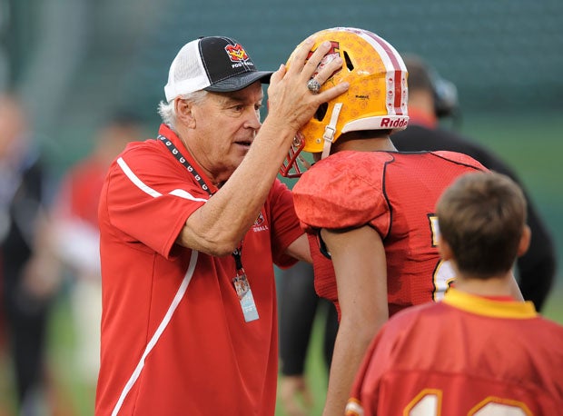 Bob Johnson with player before 2014 Southern Section title game at Angel Stadium in Anaheim.