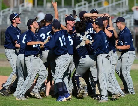 Oxford players celebrate their state Class S baseball championship on Sunday at Palmer Field in Middletown.
