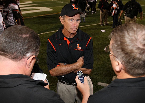 Bill Castle talks to the media after a 31-30 overtime win over California powerhouse De La Salle in 2009. (Photo: Todd Shurtleff)
