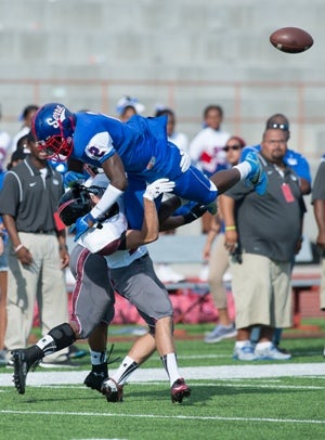 Serra's Glen Ihenacho gets airborne Saturday in theBrothers in Arms Classic.