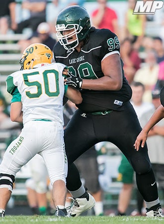 Brave Williams squares off with a West Seneca East
lineman during last Friday's home game.