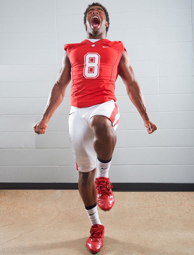 Katy linebacker Jovanni Stewart shows intensity during the photo shoot.