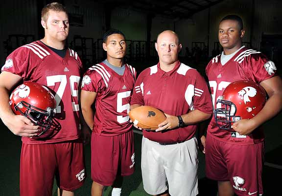 From left to right: Caleb Gulledge, Justin Thomas, head coach Jamey DuBose, and Justin Shanks.