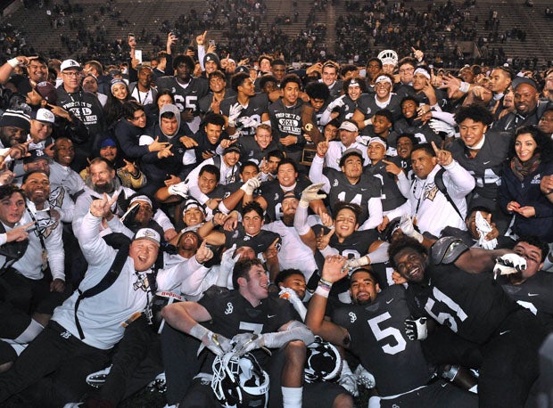 Defending 2019 MaxPreps national champions St. John Bosco celebrates after defeating De La Salle in the 2019 CIF Open Division Bowl title game. 