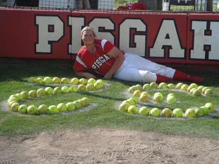 Shelby Holley, shown here with her jersey number written with softballs, hopes to have her number retired at Pisgah (Ala.). Setting the national home run record should do the trick.