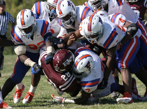 The East St. Louis defense will look to gang tackle Rockhurst this week.