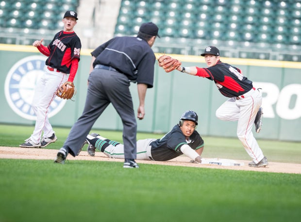 Mount Si infielders plead their case for an out at Safeco Field.