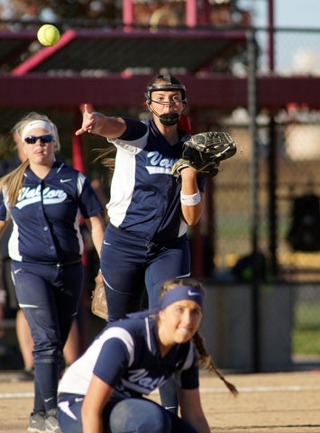 Valor Christian, behind ace pitcher Ali Kilponen, center, will
be after its fourth consecutive Class 4A state title with her
in the circle.