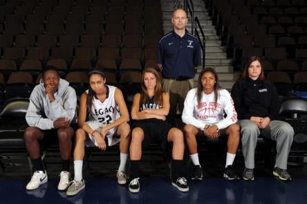 The All-Colorado girls basketball team, from left: Alexus Johnson, Kailey Edwards, Michaela Neuhaus, coach Craig Van Patten, Marquelle Dent and Brittany Hernandez.
