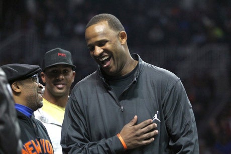 Spike Lee (left) and New York Yankees hurler CC Sabathia yuck it up during a break from the game.