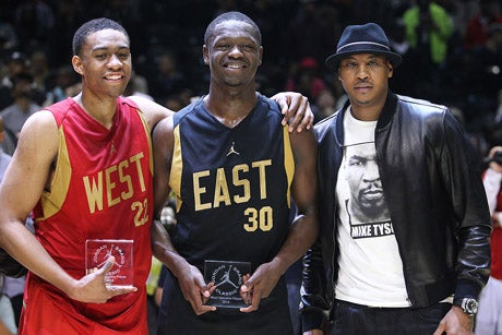 Potential NBA MVP Carmelo Anthony (right) poses with West MVP Jabari Parker (left) and East MVP Julius Randle.