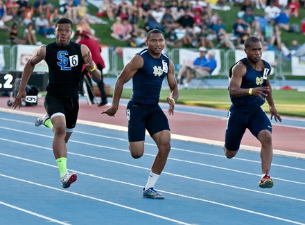 Khalfani Muhammad (middle) is getting a flood of college football interest. He's only a junior. 