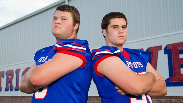 Anthony Taylor, left, and Brandon Godfrey of No. 6 John Curtis will be all business when the Patriots face No. 14 Tampa Plant in the Superdome Sept. 7 in the Sugar Bowl Prep Classic.