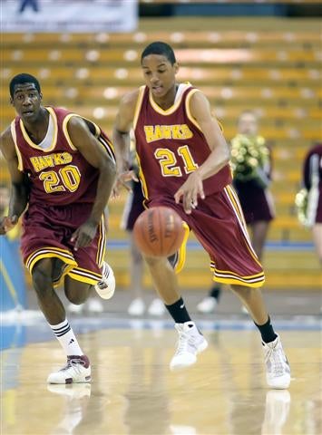 Ocean View's Anthony Brown (21) and Avery Johnson on the break.