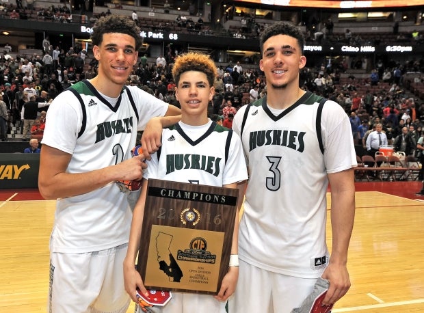 Ball brothers (from left) Lonzo, LaMelo and LiAngelo celebrate a section title at the Honda Center.