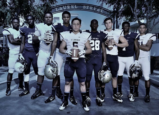 Several top players from the St. John Bosco football team pose during a photo shoot on Laurel Street in historic downtown Bellflower in Southern California.