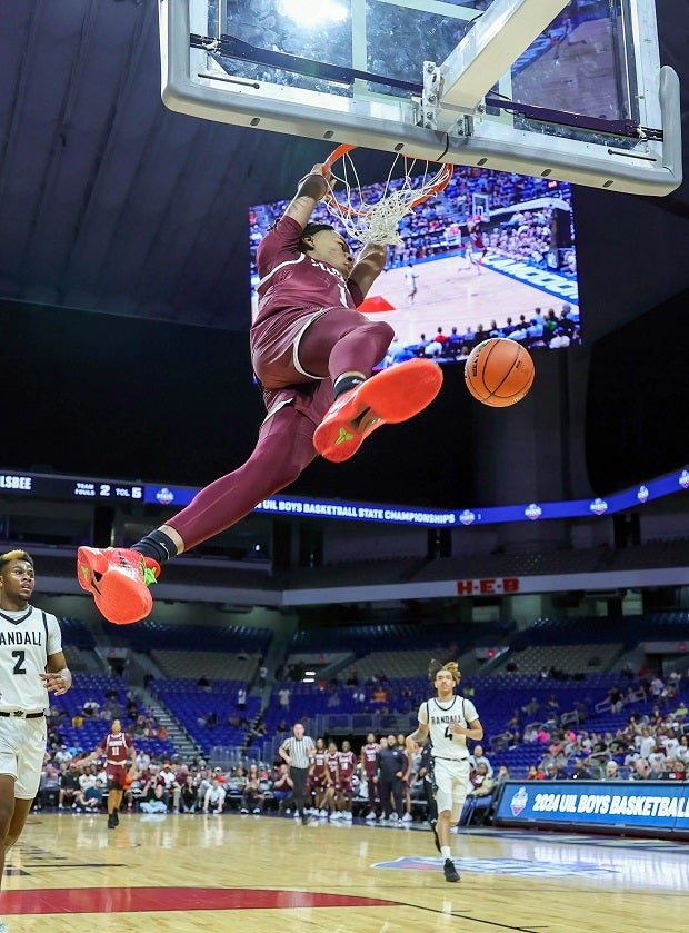 Silsbee guard Jared Harris throws down a slamhis UIL 4A semifinal game against Randall at the Alamodome in San Antonio. (Photo: Robbie Rakestraw)