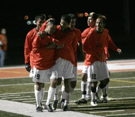 Daniel Devora (9) and his Adams City teammates have had a lot to celebrate this season. The Eagles are the top seed in Class 5A as the state tournament starts Wednesday.