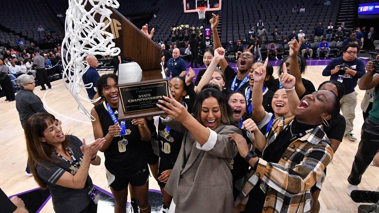 Bishop Montgomery coach Rheina Ale celebrates the Kinghts' CIF Division I title on Friday at Golden 1 Center. Bishop Montgomery beat Bishop O'Dowd 52-40 on the strength of a strong first quarter. (Photo: David Steutel)