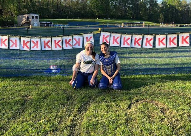 Mahopac softball pitcher Shannon Becker and catcher Michelle Dellamura pose after Becker's 21-strikeout game.