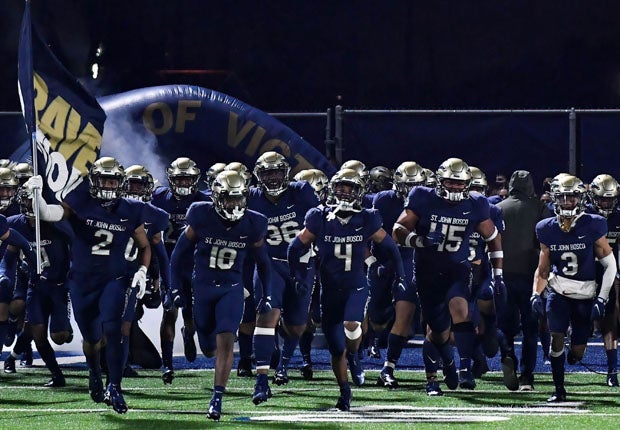 St. John Bosco takes the field before its season opener with Sierra Canyon. 