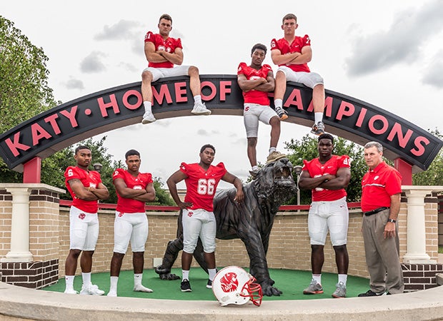 Head coach Gary Joseph (right) stands along with several top returning players.