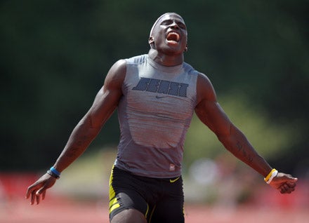 Tyreek Hill displays utter elation after winning the 200 in a blazing time of 20.57 seconds. 
