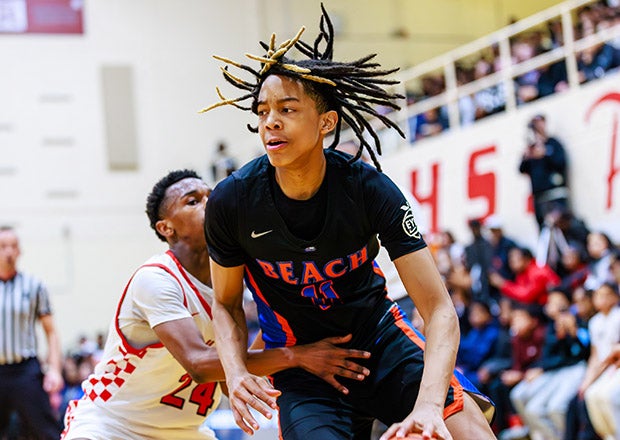Freshman phenom J.J. Crawford shined in his first high school basketball game at his father's alma mater. (PHOTO: Jason Wang)