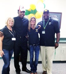 Derrick Henry with administrators
the day he committed to Alabama. 