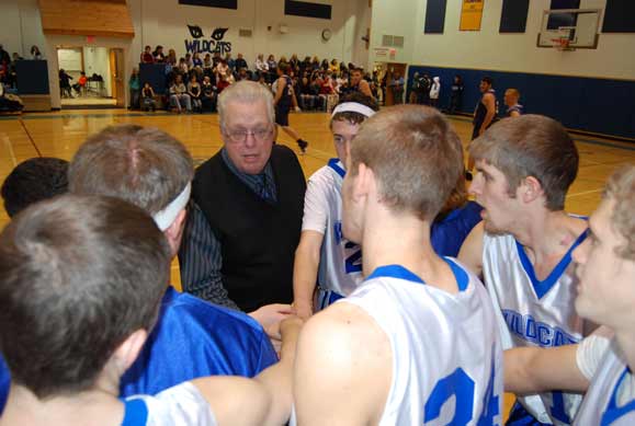Don Van Valkenburgh instructs his players during a time out.
