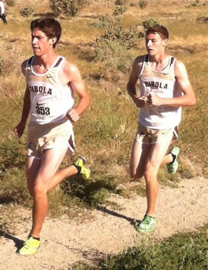 Chris Harlow in front of teammate Frankie
Scorfina.