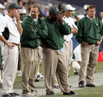 The De La Salle coaches, including Bob Ladouceur,
at the far right, were befuddled most of the night.