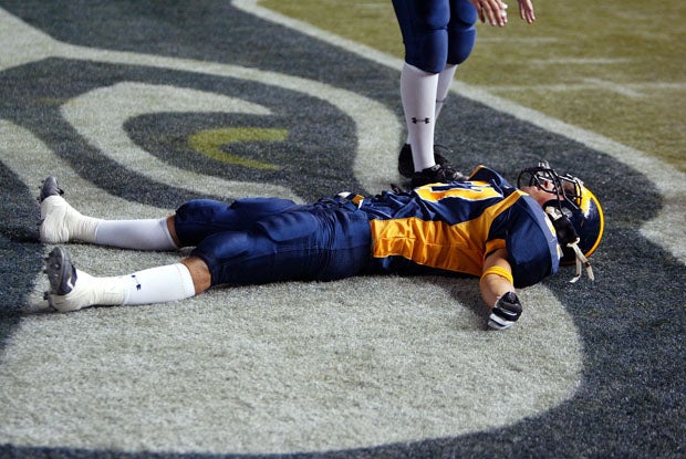 An unidentified Bellevue player enjoys the moment in the end zone. 