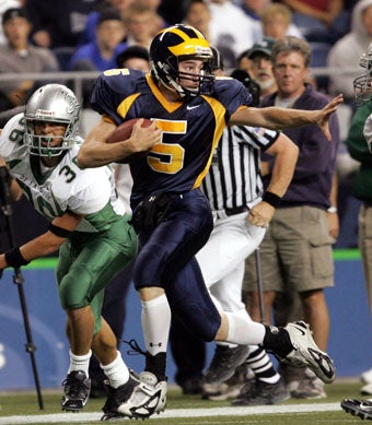 Sophomore quarterback Eric Block was brilliant in
his first varsity start.