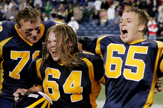 Ethan Marks (78), Jordan Hebert (64) and Griffin Bennett (65) rejoice in the waning moments of Bellevue's 39-20 win over De La Salle on Sept. 4, 2004. The victory snapped a streak of 151 consecutive victories by De La Salle, still a national record. Almost 25,000 witnessed the game at Qwest Stadium in Seattle, including MaxPreps national columnist Mitch Stephens. 