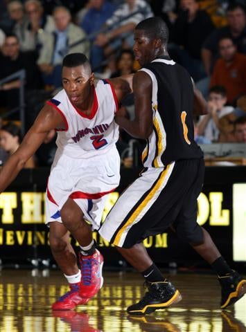 Shawn Williams guarded by Kenny Boynton, a future 
Florida Gator who turned down the Duke Blue Devils.