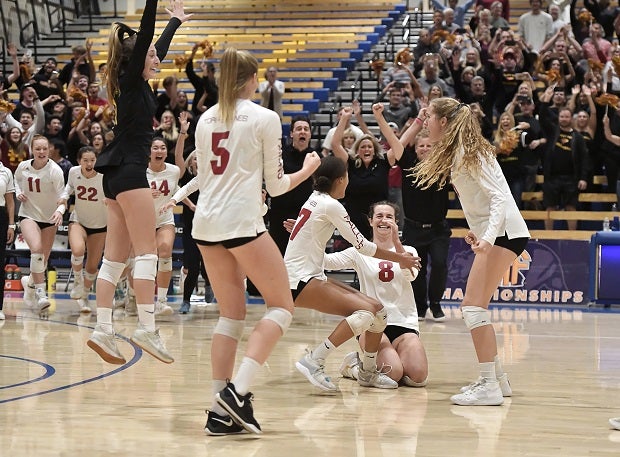 Torrey Pines players celebrate winning the CIF Open Division title over Marin Catholic.