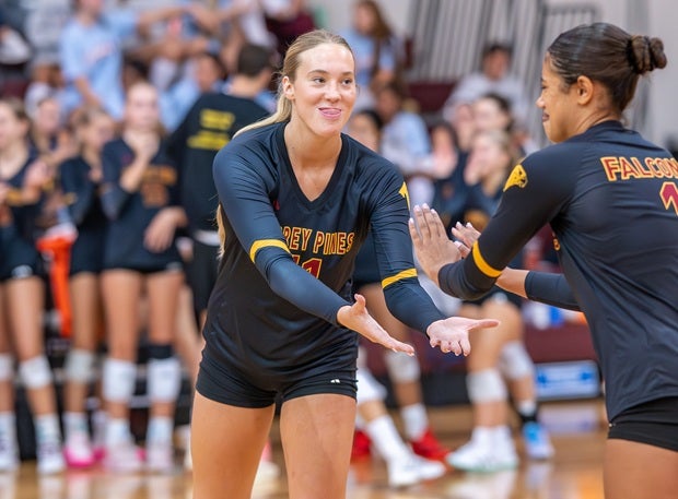 Torrey Pines hitters Finley Krystkowiak (left) and Jaycee Mack celebrate during the Falcons' Volleypalooza title victory on Saturday. No. 12 Torrey Pines beat rival No. 13 Cathedral Catholic in a MaxPreps Top 25 showdown. (PHOTO: Tim Dunnahoo)