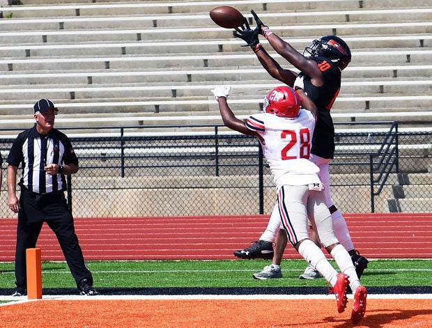 Hoover receiver Brad Hopkins makes a superb catch in the corner of the end zone to close the scoring. 