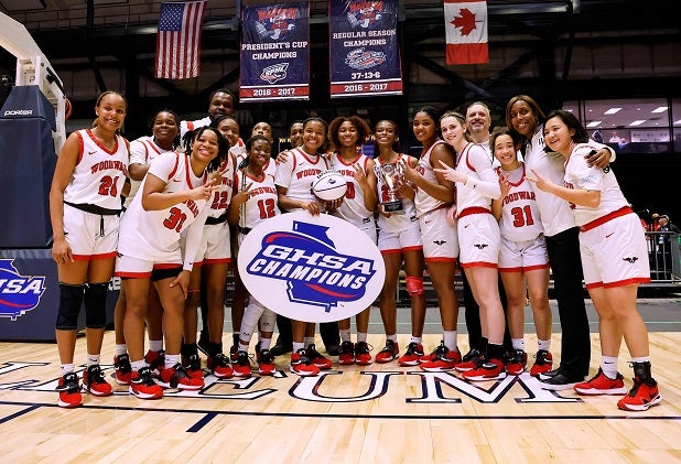 Woodward Academy celebrates its Georgia AAAAA championship.