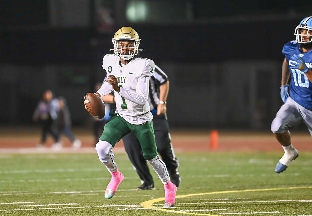 Long Beach Poly quarterback Darius Curry leads the Jackrabbits in their Southern Section Division 1 playoff game Friday against Los Alamitos. (Photo: Christopher Harris)