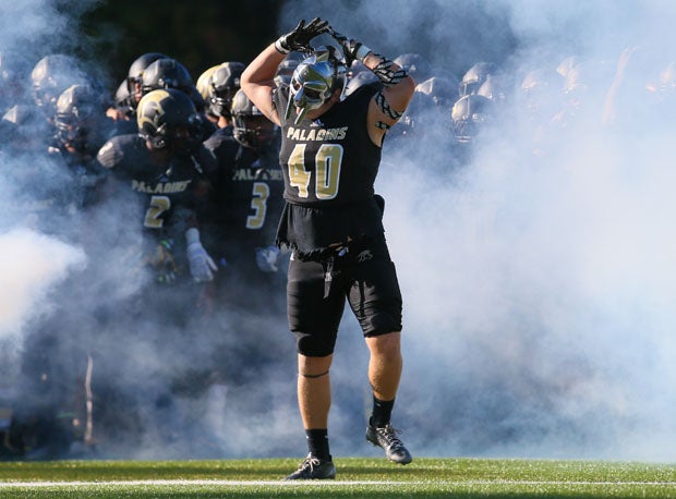 Denis Mucha (40) symbolizes Paramus Catholic's momentous 21-14 victory over No. 1 Don Bosco Prep Saturday afternoon.