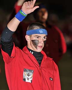 A Coppell student wears Jacob's
picture pinned to his chest.