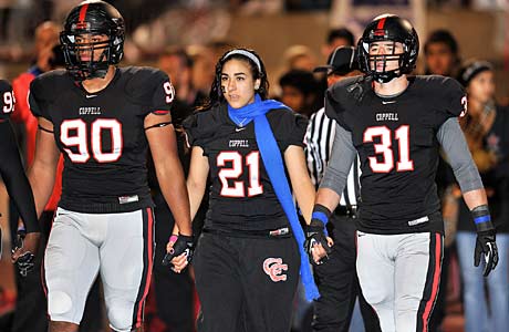 Jacob Logan's sister, Jordan, wore his jersey and represented him during the coin toss before the game.