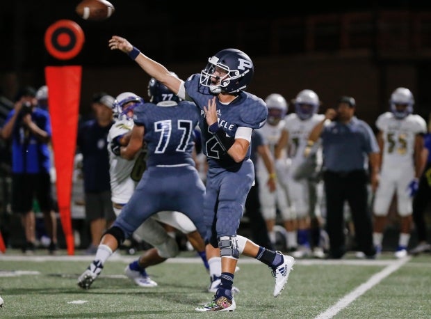 Rattler threw for three touchdowns, ran for two more and caught a scoring pass in Pinnacle's win.