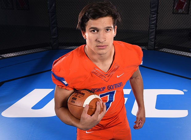 In a bit of an ironic twist of fate, Biaggio Ali Walsh participated in a photo shoot in the UFC octagon with his Bishop Gorman teammates prior to the 2016 season. (Photo: Jann Hendry)