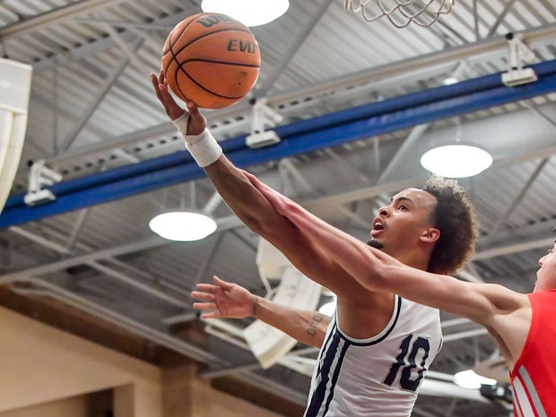 Amari Bailey goes in for two of his team-high 16 points.