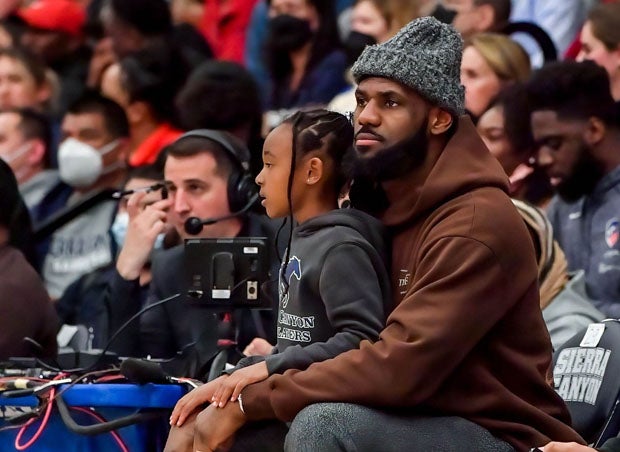 LeBron James watches intently from courtside during Sierra Canyon's late comeback win over Mater Dei.