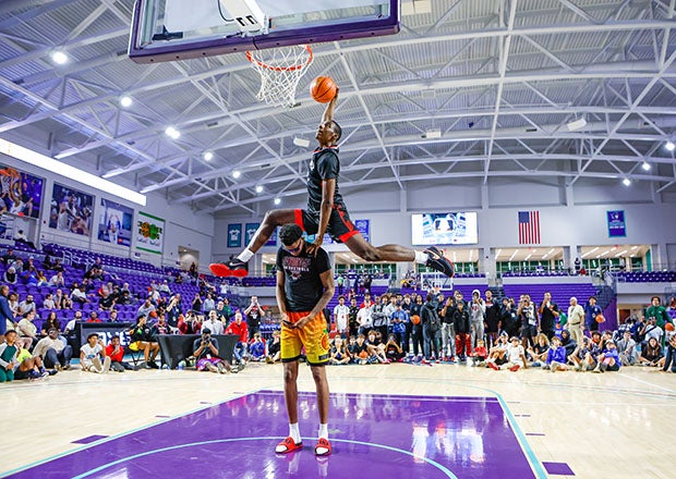 Baasil Saunders of Imhotep Charter rises over Kentucky-bound teammate Justin Edwards on his way to winning the slam dunk contest at the City of Palms Classic in Fort Myers. (Photo: Pete Wright)